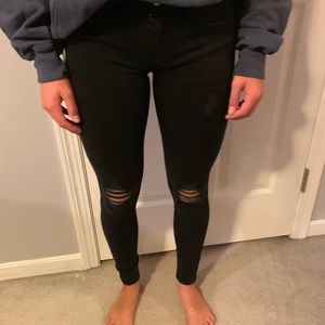 Black ripped jeans from American Eagle.